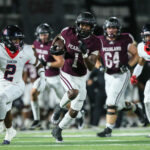 PEARLAND TOUCHDOWN - Pearland sophomore QB Jackson Hamilton tossed a short pass to junior WR Patrick Bridges (1) at the Dawson 46, and he turned on the jets to weave his way to the goal line to complete the 51-yard throw and catch for the score to cut the lead to 14-7 which stood at intermission. (Photo by Lloyd Hendricks)