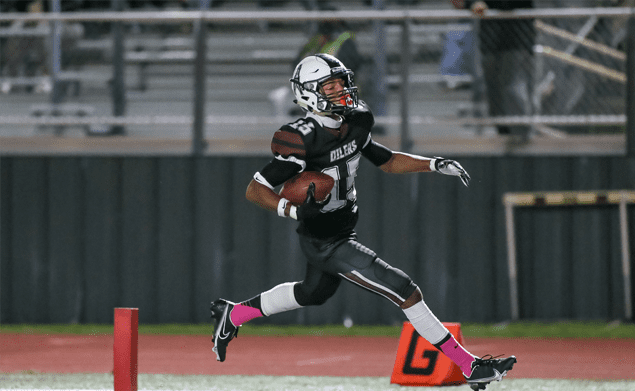 PEARLAND TOUCHDOWN - Pearland wide receiver William Foster scores on a 46-yard pass from QB Jake Sock to give the Oilers a 6-3 lead over Dawson with 3:40 left in the first half. The PAT was blocked leaving the score at 6-3. The Eagles rallied in the second half to win the annual Bayway Chevrolet PearBowl 17-6 for the second consecutive year. Dawson has a 4-3 edge in the series. (Photo by Lloyd Hendricks)