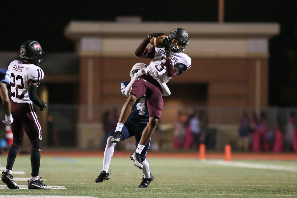 LEAPING INTERCEPTION - Pearland junior safety Ashton Hampton (3) skies high to grab an interception vs Alief Elsik. Hampton also had a touchdown saving pass break up later in the game as the Oilers beat the Rams 44-13 for their first district win. Pearland evens their league mark at 1-1 and 2-3 overall for the season. The Oilers will host Alvin for Homecoming on Friday, October 7 at The Rig at 7:00 p.m. (Photo by Lloyd Hendricks)