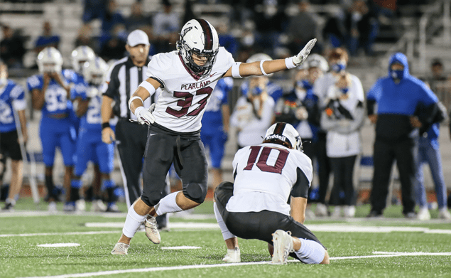 RIGHT ON TARGET - Pearland senior placekicker Caleb Mendez (33) booted field goals of 35, 40, and 37-yards plus 5-for-5 PATs in sparking the Oilers over Clear Springs 44-37 in the Class 6A Region III Div. I bi-district round of the playoffs. Issac Sanchez (10) is the holder. Pearland will face Atascocita on Friday, December 18 at 7:00 p.m. at Sheldon ISD Panther Stadium. The Eagles are 6-2 overall and defeated Pasadena Dobie 54-14 to advance to face the Oilers. (Photo by Lloyd Hendricks)