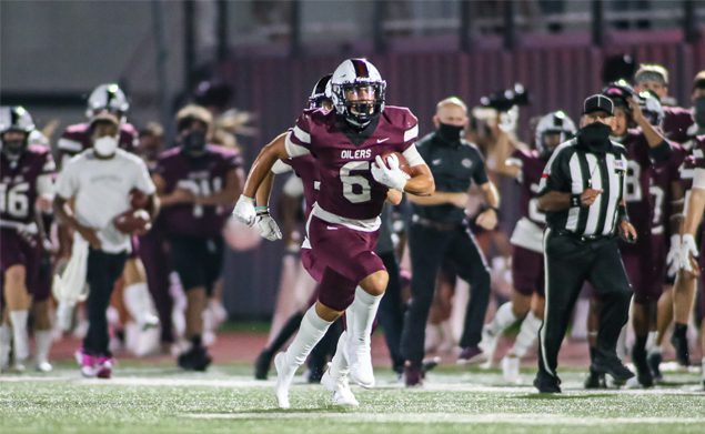 RECORD-TYING RUN - Pearland junior running back Dominic Serna (6) brought the crowd to their feet when he reeled off a PHS record-tying 98-yard touchdown romp against The Woodlands to help the Oilers to a 21-3 non-district win in the 2020 opener for both teams. Serna tied the record set by former All-State Pearland running back Dustin Garrison in 2010 when he scored on a 98-yard run against La Porte. The Oilers went on to win the 5A Div. I state title that season with a 16-0 mark. Serna led Pearland with 121 yards and a TD on seven carries. (Photo by Lloyd Hendricks)