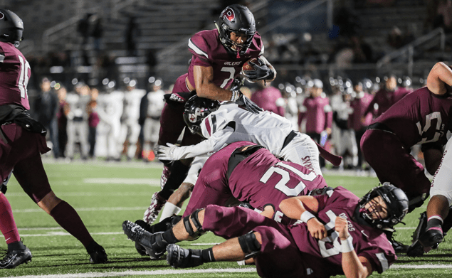 UP AND OVER - Pearland junior running back Brandon Campbell (7) leaps over the offensive line to score on a 1-yard touchdown. Campbell rushed for 80-yards on 13 carries and scored four TDs on runs of 1, 32 1, and 37-yards to lead the Oilers to a 49-7 pounding of George Ranch. Pearland will face Dickinson in the Class 6A Region III Div. I bi-district playoffs on Friday, November 15 at 7:00 p.m. at Sam Vitanza Stadium in Dickinson. (Photo by Lloyd Hendricks)