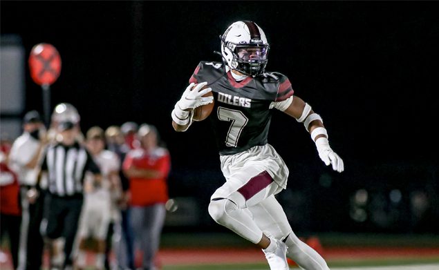 PICK 6 - Pearland defensive back Dylan Dixon sparked the Oilers with an interception early in the second half in which he turned into a 60-yard touchdown. The score gave Pearland a 14-0 lead that turned into a 28-7 non-district win. The Oilers (2-0) will travel to face the Strake Jesuit Crusaders (0-1) on Friday, October 9 at 7:00 at Crusader Stadium. (Photo by Lloyd Hendricks)