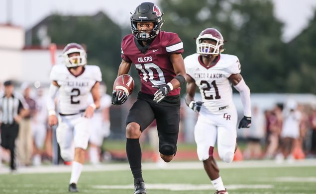 OFF TO THE RACES - Pearland junior wide receiver Cedric Mitchell (10) wins the race to the end zone after hauling in a 53-yard pass from QB J.D. Head giving the Oilers a 14-0 first quarter lead over Cinco Ranch. The No. 6 area-ranked Oilers went on to trounce the Cougars 45-0 to improve to 3-0 on the season. Pearland has an open date this week, but will open district action on Friday, September 27 at Crump Stadium when they face Alief Taylor at 7:00 p.m. (Photo by Lloyd Hendricks)