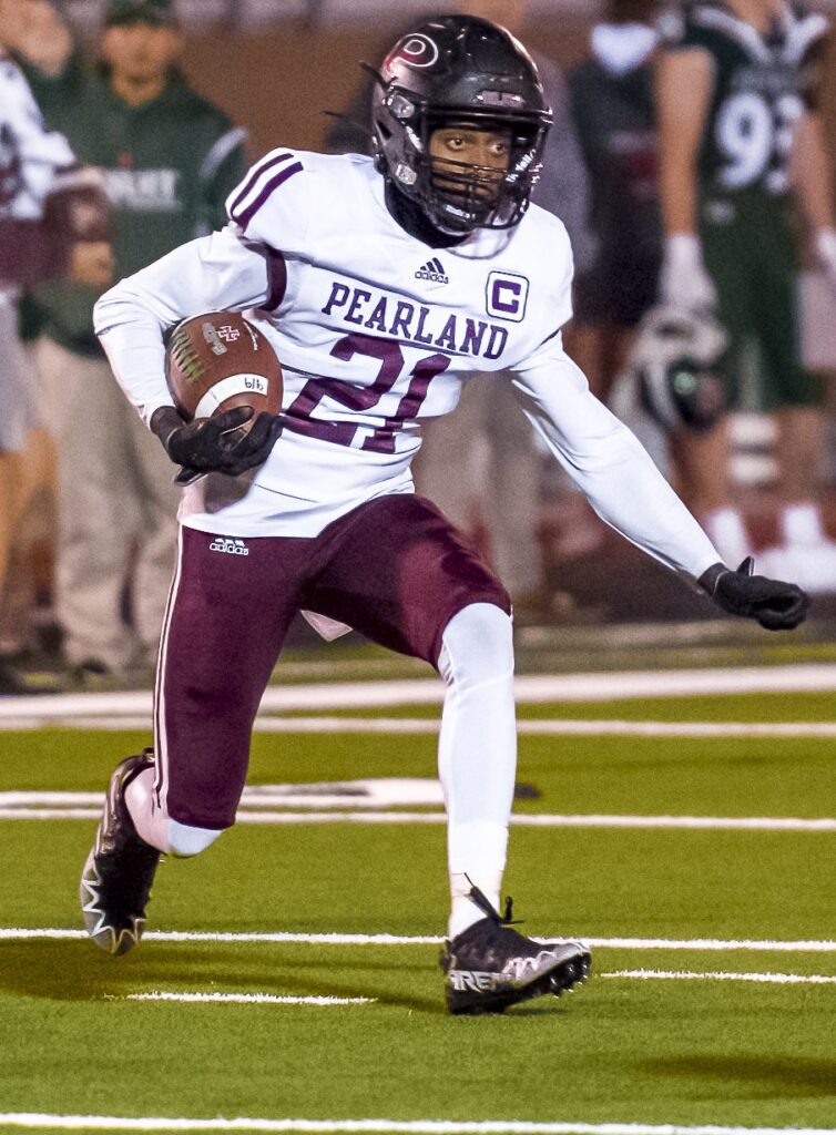 GREAT DEFENSIVE PLAY - Pearland's Gabriel Sheppard intercepts a Strake Jesuit pass and takes it for a short return in the third quarter. Pearland defeated the Crusaders 24-14 to advance to the playoffs for the 23rd consecutive year. The Oilers will host Hastings on Thursday, November 3 at 6:00 p.m.(Photo by Olyn Taylor)