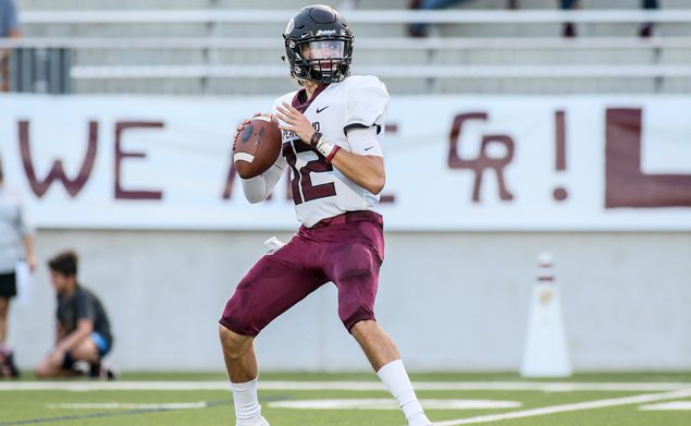 RECORD SETTER - Pearland quarterback J.D. Head (12), who moved to Pearland from Oklahoma back in the summer, has already made his presence known, as the junior field-general broke two passing records for the Oilers in a 56-28 win over Cinco Ranch. Head threw for 357 yards and six touchdowns which broke former All-State quarterback Trey Anderson's single-game record of 314 yards that he set when the Oilers beat Katy 38-35 in the 2010 Class 5A Region III Div. I finals. Pearland ended up winning the 5A Div. I state title that season. The six touchdown passes by Head also set a new standard beating the previous mark of four touchdown passes in a single-game by a couple of former Pearland quarterbacks. (Photo by Lloyd Hendricks)