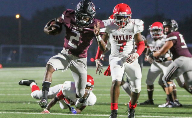 TRIFECTA - Pearland running back Jaelin Benefield (2) scored three touchdowns and each one was 2-yard runs. The speedster had 24 carries for 148 yards in leading the Oilers to a 28-0 win over Alief Taylor in the District 23-6A opener for both teams. (Photo by Lloyd Hendricks)