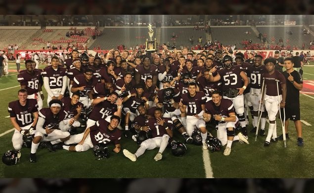 PEARBOWL TROPHY RETURNS TO PEARLAND HIGH SCHOOL - The Pearland Oilers beat the Dawson Eagles at UH's TDECU Stadium in the 5th Annual Bayway Chevrolet PearBowl 56-27. The PearBowl Trophy will go to Pearland High School to be displayed for a year until next year's contest when the teams will play for the trophy again. Both teams are winners as Bayway Chevrolet gave each school $5,000 to be given toward scholarships for Football and the Fine Arts. (Photo by Lloyd Hendricks)