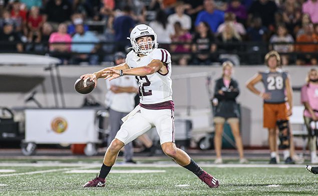 TOUCHDOWN THROW - Pearland senior QB Jake Sock (12) throws one of his three touchdown passes against Alvin as the Oilers beat the Jackets 56-14. Sock was 7-of-10 passing for 166 yards and and three TDs. Pearland will host Alief Elsik on Friday, October 8 at 7:00 p.m. at The Rig. (Photo by Lloyd Hendricks)