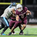 LOOKING FOR RUNNING ROOM - Pearland senior running back Dominic Serna scored three touchdowns against Shadow Creek while picking up 79 yards on 17 carries. The Oilers came up short against the Sharks 34-27. Pearland faces cross-town cousin Dawson in the PearBowl on Thursday, November 4 at 7:00 p.m. at Pearland ISD Stadium. (Photo by Lloyd Hendricks)