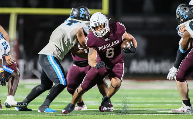 LOOKING FOR RUNNING ROOM - Pearland senior running back Dominic Serna scored three touchdowns against Shadow Creek while picking up 79 yards on 17 carries. The Oilers came up short against the Sharks 34-27. Pearland faces cross-town cousin Dawson in the PearBowl on Thursday, November 4 at 7:00 p.m. at Pearland ISD Stadium. (Photo by Lloyd Hendricks)